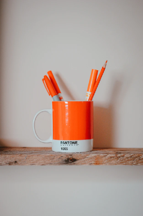Execute Brand Strategy - Image of Pantone 1505 Colour Mugs, Pens and Pencil